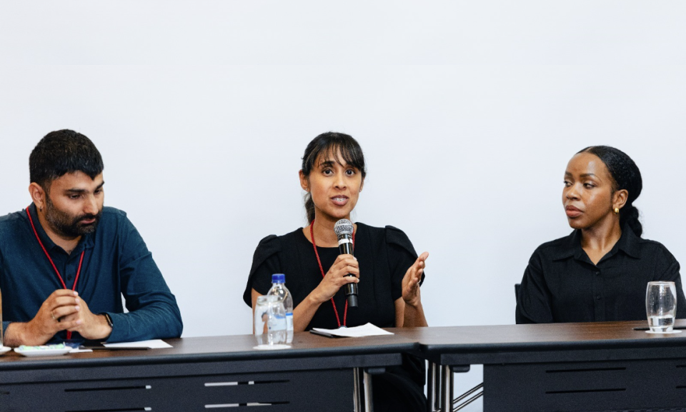 Radhika Sundararajan speaking at a panel