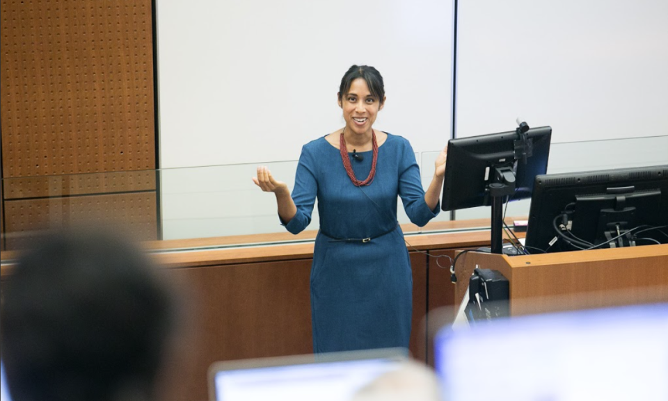 Dr. Sundararajan speaking at a conference